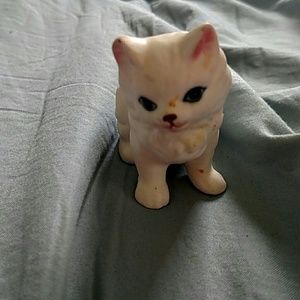 One plain white cat knick knack